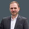 Patrick Miles Porträtbild von Patrick Miles vor grauem Hintergrund