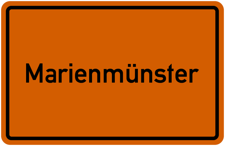 Ortseingangsschild Marienmünster - schwarze Schrift auf orangenem Grund